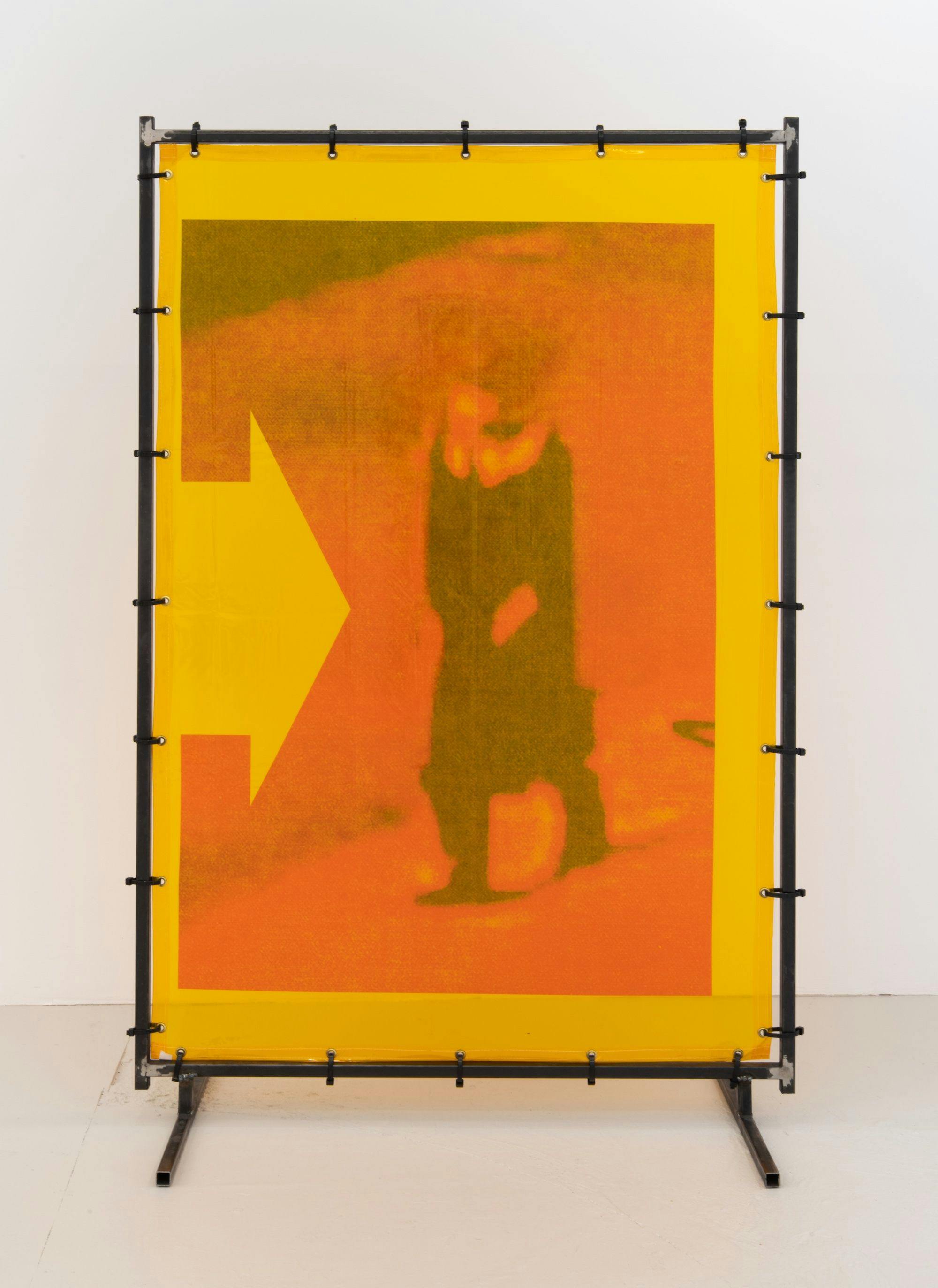 A yellow and orange painting of a human figure in motion on a black stand.